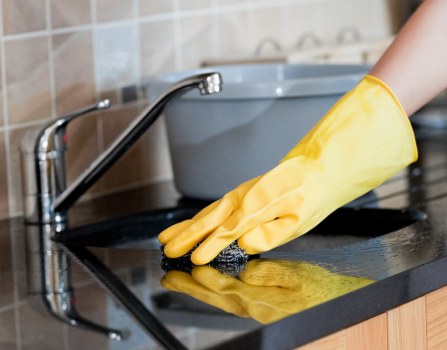 Local cleaners working in a Marylebone flat after a busy period